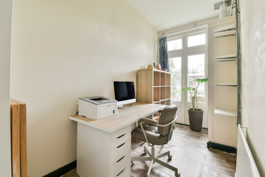 Home office with furniture and computer