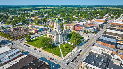 Bright summertime aerial Columbia City downtown courthouse with busy street