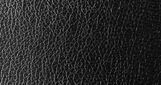 Black leather texture close up. 