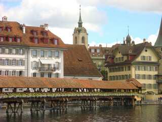 Fototapeta premium View of the bridge and city on a summer day. Lucerne. Switzerland