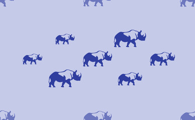 Seamless pattern of large isolated blue rhinoceros symbols. The pattern is divided by a line of elements of lighter tones. Vector illustration on light blue background