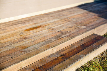 Wet terrace wood planks boards with narrow DOF