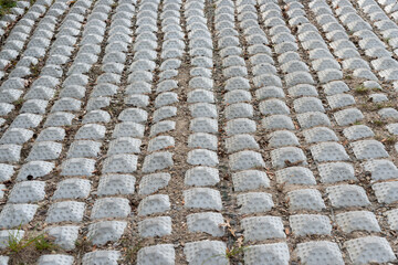 erosion control mat on the ground near a ravine to reduce soil erosion
