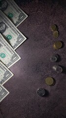 Dollar banknotes on a dark background