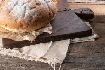 Rustic, baked sourdough boule.