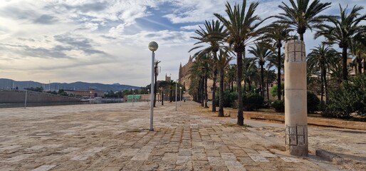 timeless beauty of Mallorca Cathedral, also known as La Seu, with this stunning photograph. The magnificent Gothic architecture of this iconic religious landmark, combined with its stunning location o