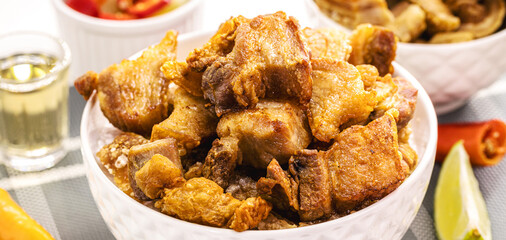 Crackling bowl, Brazilian appetizer made by frying bacon, leather or meat and lots of fat, taken from the pork belly.