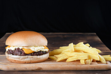 sandwich with beef burger on brioche bread salad egg and bacon street food fast food