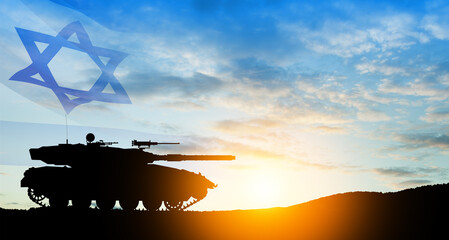 Silhouette of army tank at sunset sky background with Israel flag. Military machinery.