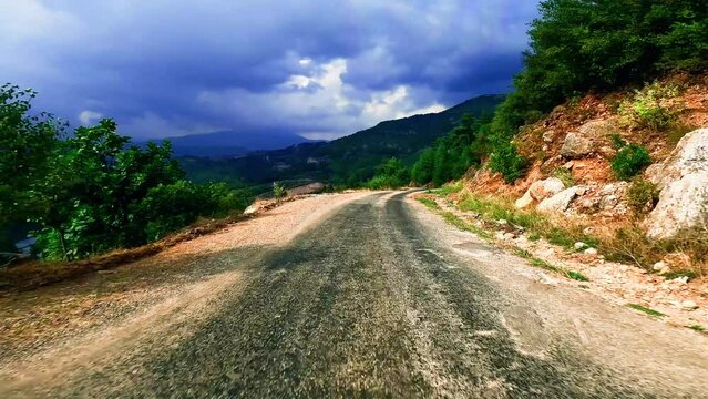 Road trip by car along the mountain roads and serpentines on sanset of Turkey.