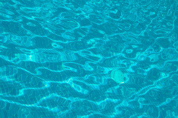 Fototapeta na wymiar Pool water of Cyprus Ayia Napa, sun lens flares