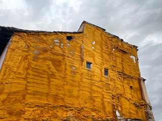 side facade of an old house coated with sprayed polyurethane, Projected polyurethane foam....