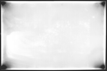 Vintage photo film frame of a middle format camera,  transparent background with dirty spots, film grain and vignetting (png image). Useful for old photo simulations, effects and template.
