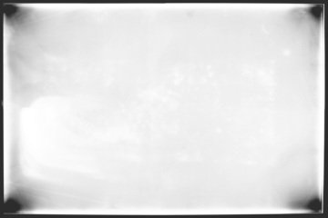 Vintage photo film frame of a middle format camera,  transparent background with dirty spots, film grain and vignetting (png image). Useful for old photo simulations, effects and template.