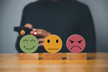 Customer feedback results in hand-picked smiley face on a wooden block circle, signifying the best...