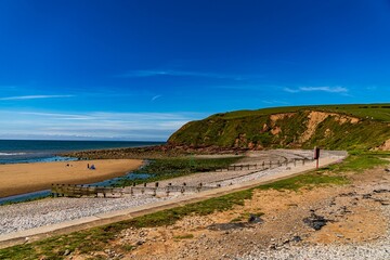 Fototapeta na wymiar A summers day view looking over st Bees beach in Cumbria, United Kingdom.
