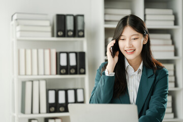 Financial institution worker female asian people, professionals engrossed in tasks. Business people...