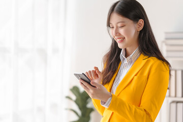 Female loan service providers asian people business professionals ensuring easy loan processes, working diligently, guiding clients through financial pathways, and mapping success.