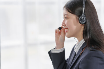 Female asian people call center representatives. Business individuals engrossed in conversations, bridging gaps, delivering quality customer support, and fostering brand loyalty.