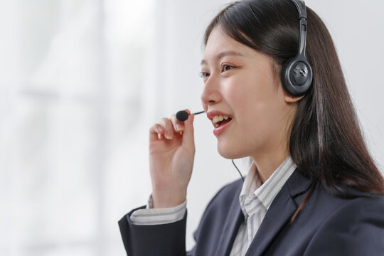 Female asian people call center representatives. Business individuals engrossed in conversations, bridging gaps, delivering quality customer support, and fostering brand loyalty.