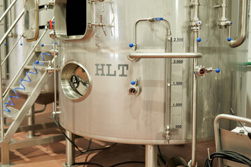 industrial beer brewing tank in a small alcohol factory business