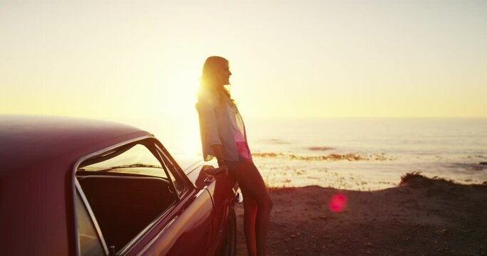 Beach, sunset and woman travel with a car for a road trip, adventure or relax with freedom on vacation. Summer, holiday and girl with happiness at sunrise for a drive, journey or celebration of life