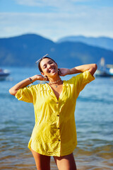 Fototapeta na wymiar portrait Latin American young woman happy enjoying the beach and sun