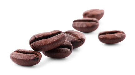 Many roasted coffee beans isolated on white