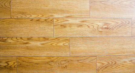 Linoleum texture. Light-colored wood-look linoleum flooring.