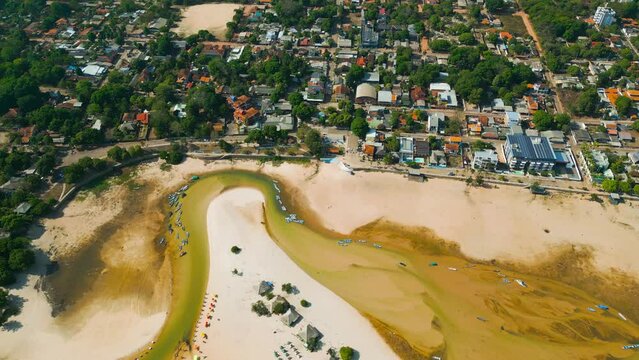 Aerial view of Alter do Chao village in front the dried-up Tapajos river during the 2023 amazonian dry season