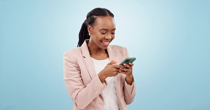 Black woman, typing and funny meme on social media, communication or laughing at online video on blue background. Happy, face and crazy comedy joke on internet, mobile app or chat on cellphone