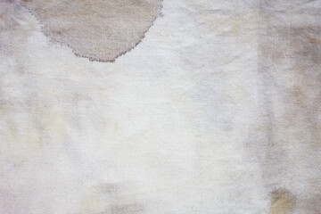 Dirty rag. Stained fabric, the surface of the fabric is stained. Fabric, matter stained with stains.