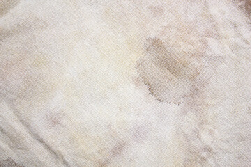 Dirty rag. Stained fabric, the surface of the fabric is stained. Fabric, matter stained with stains.