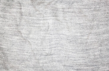 Crumpled knitted sweater, jacket, jumper. The light jacket is wrinkled.