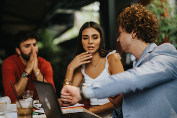 Architects, engineers, and executives discuss project plans at a coffee bar. The young woman contributes to the successful development of a construction project.