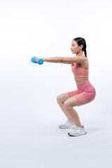 Vigorous energetic woman doing dumbbell weight lifting exercise on isolated background. Young...