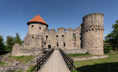 Fototapeta na wymiar looking across moat to the walls of Cesis Castle, Cesis, Latvia