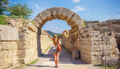 Tour tourism in Greece- Peloponnese,  Ruins in ancient Olympia, archaeologic site