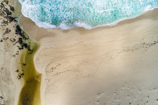 Aerial view of the Margaret River mouth where it meets the Indian Ocean.