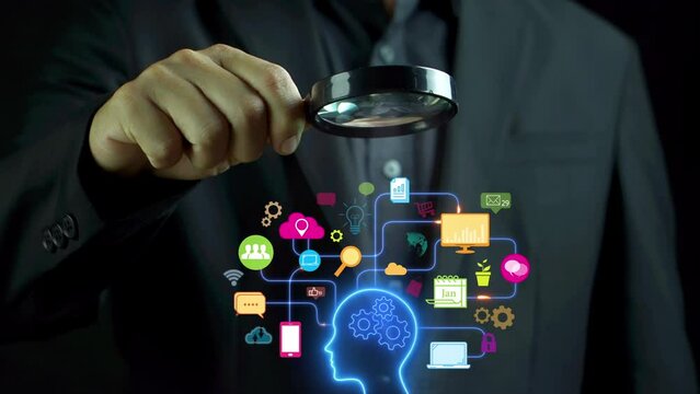 The business man use magnifying glass and show human brain thinking about network communication..