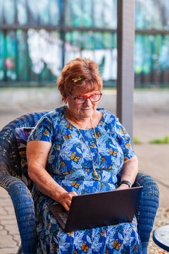 Senior Australian woman using laptop to video call