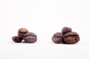 close-up of roasted coffee beans isolated on white background