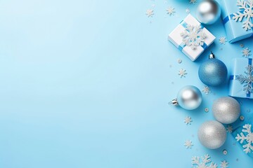 Christmas Eve concept. Top view photo of blue and silver baubles snowflake ornaments stylish present boxes and confetti.