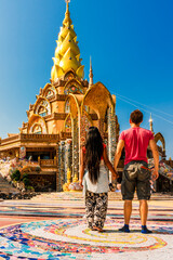 Couple travel people enjoy beautiful view Thailand temple Wat Phra Thart Pha Sorn Kaew. Asian culture, religion and travel destination in Asia