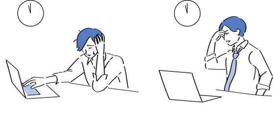 深夜まで残業をして疲労しているワイシャツの男性