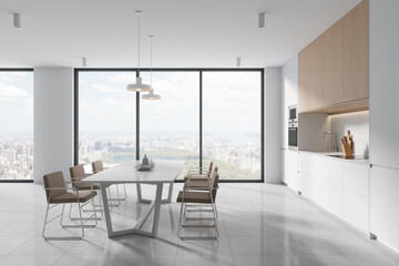 Elegant home kitchen interior with dining table and shelves, panoramic window