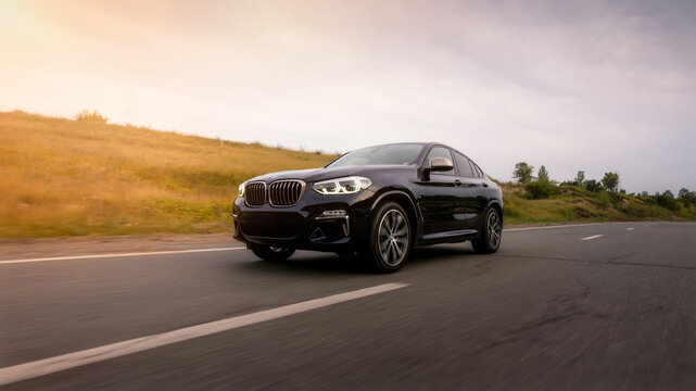Seattle, Washington, USA, August 30, 2023 BMW x4 black. the car is driving on the highway.  