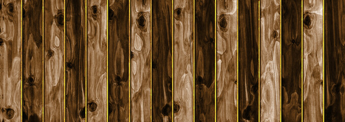 Vintage dark brown vertical wooden planks with golden lines