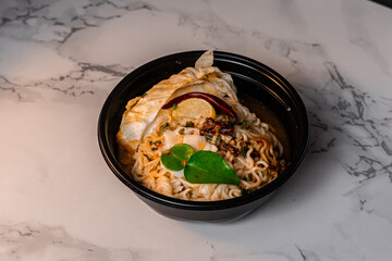 Photograph of Thai style noodles, 45 deegree view, with lighting and shadows added to add dimension and elegance that hides the boldness. If you add fonts, it will make your work look even better.