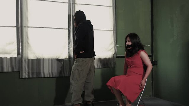 Young woman escapes from kidnapping in dark room illegal human trafficking kidnapping for ransom